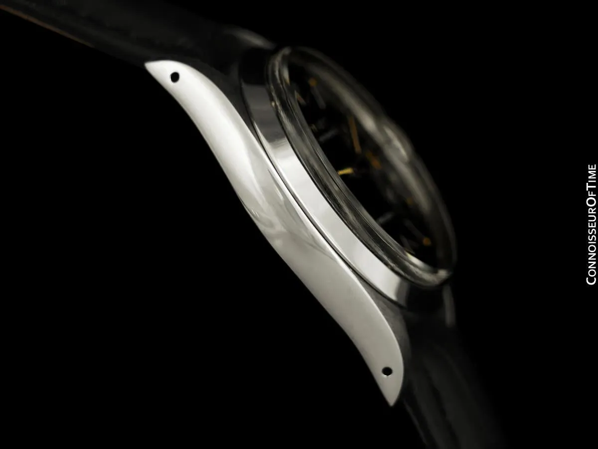 1956 Rolex Oysterdate Vintage Mens Handwound Watch with Red & Black Roulette Date - Stainless Steel