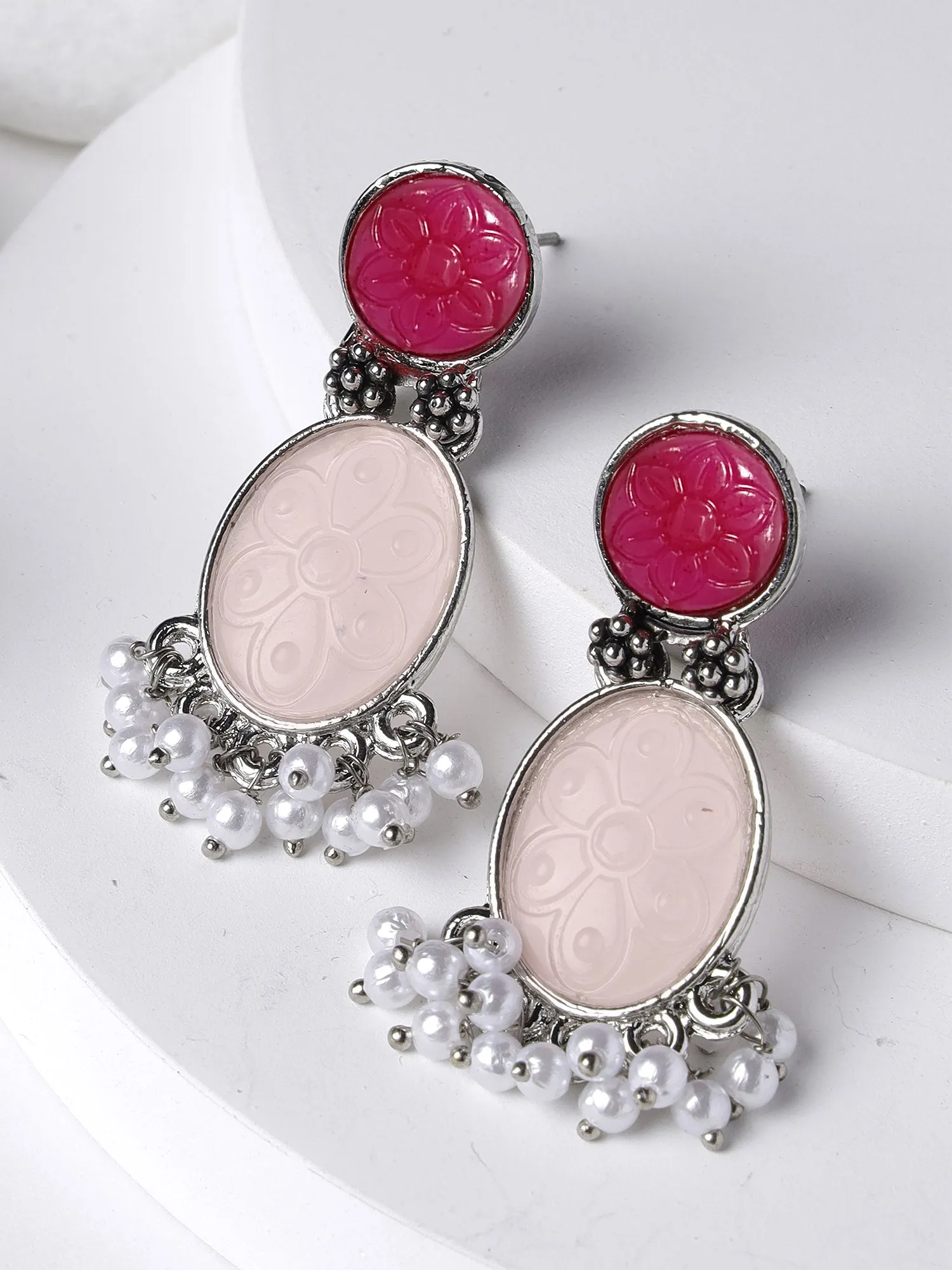 Karatcart Silver Tone Oval Shape Ruby Pink Carved Stone Studded Drop Earrings for Women