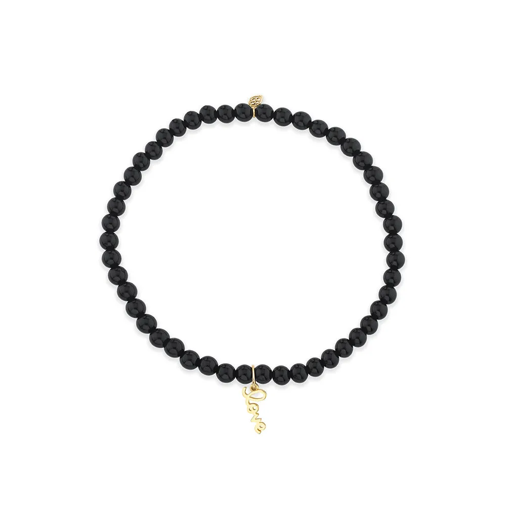 Pure Gold Tiny Love on Onyx