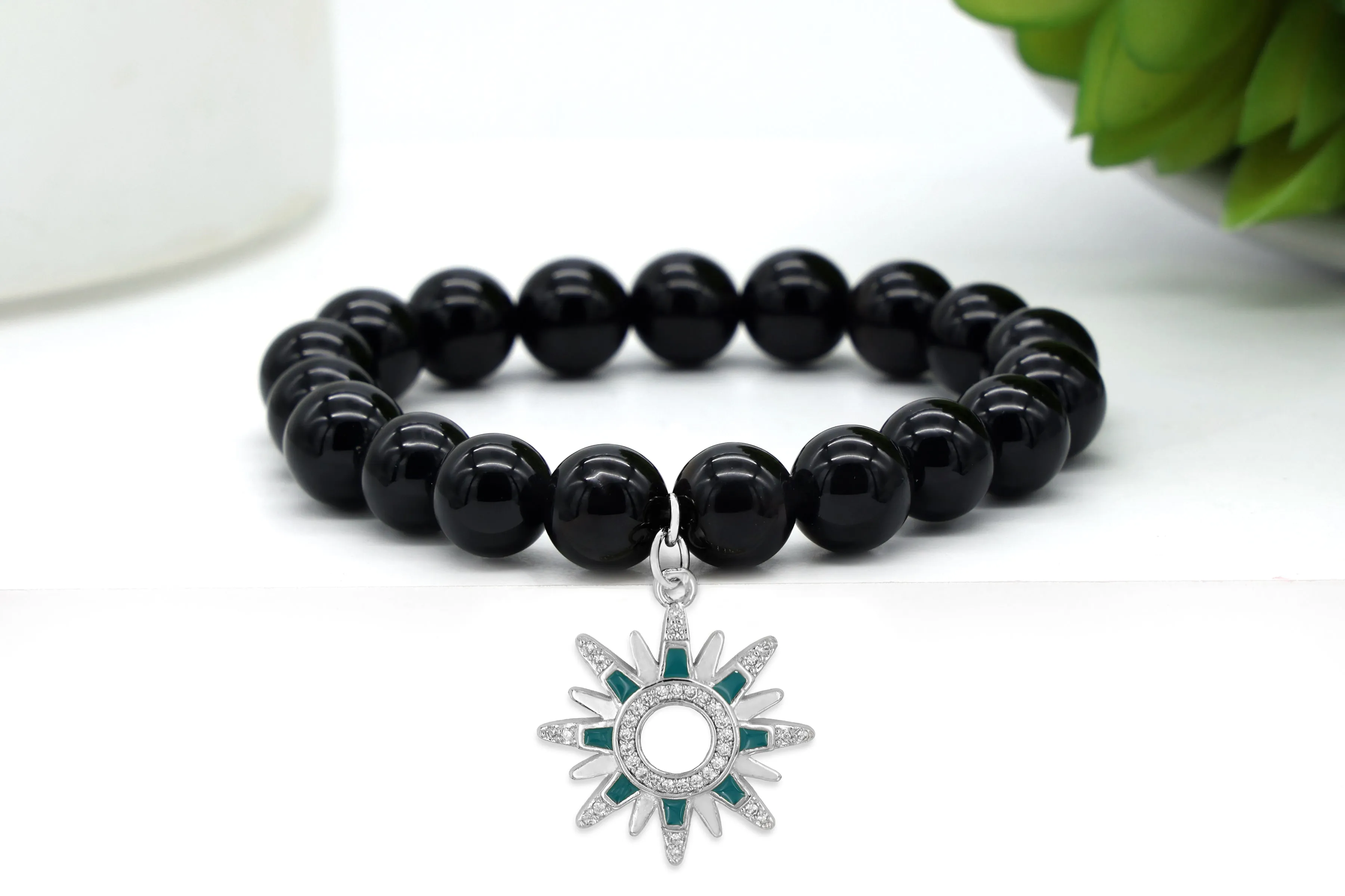Silver Blue Sunburst Charm