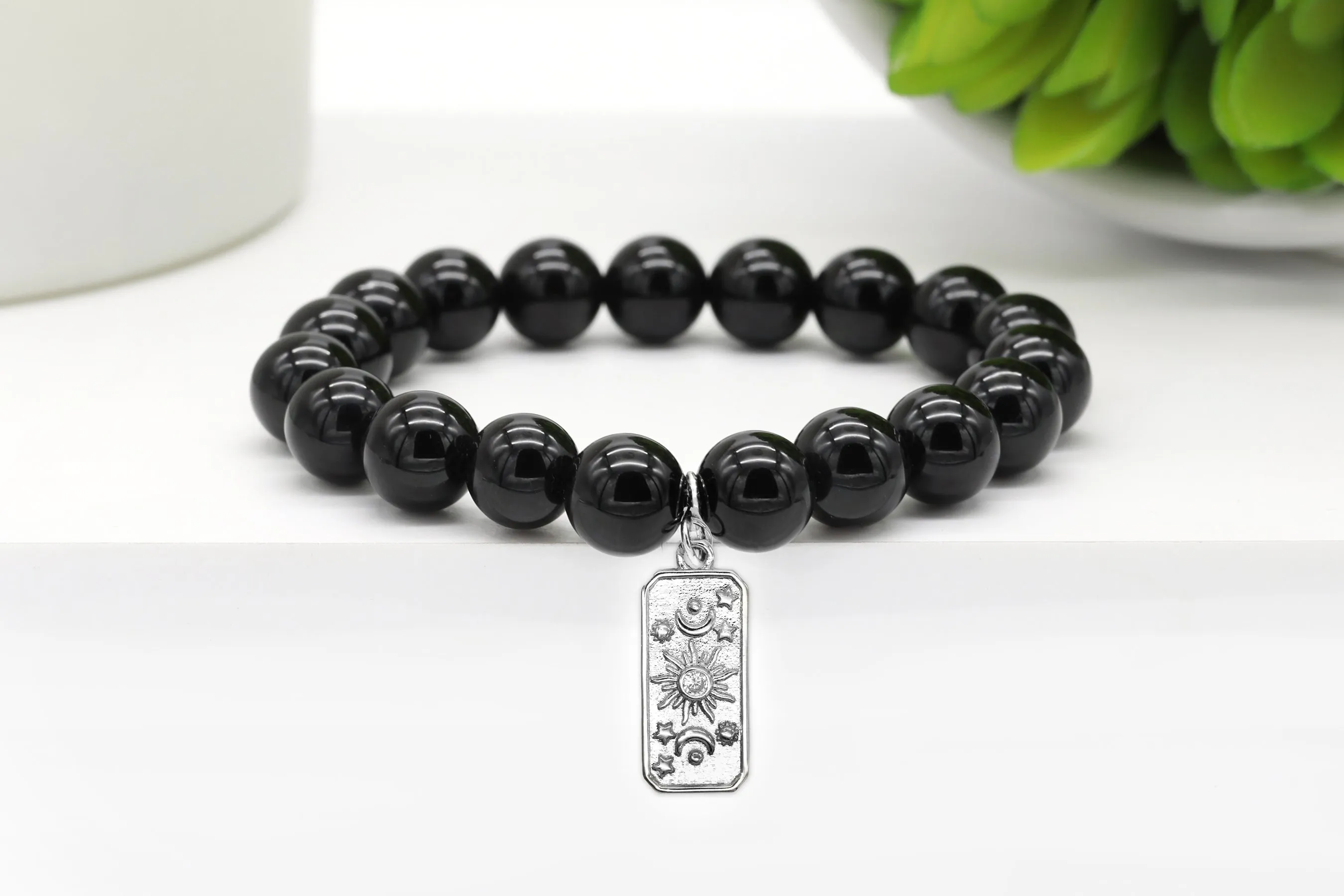 Silver Sun and Moon Charm