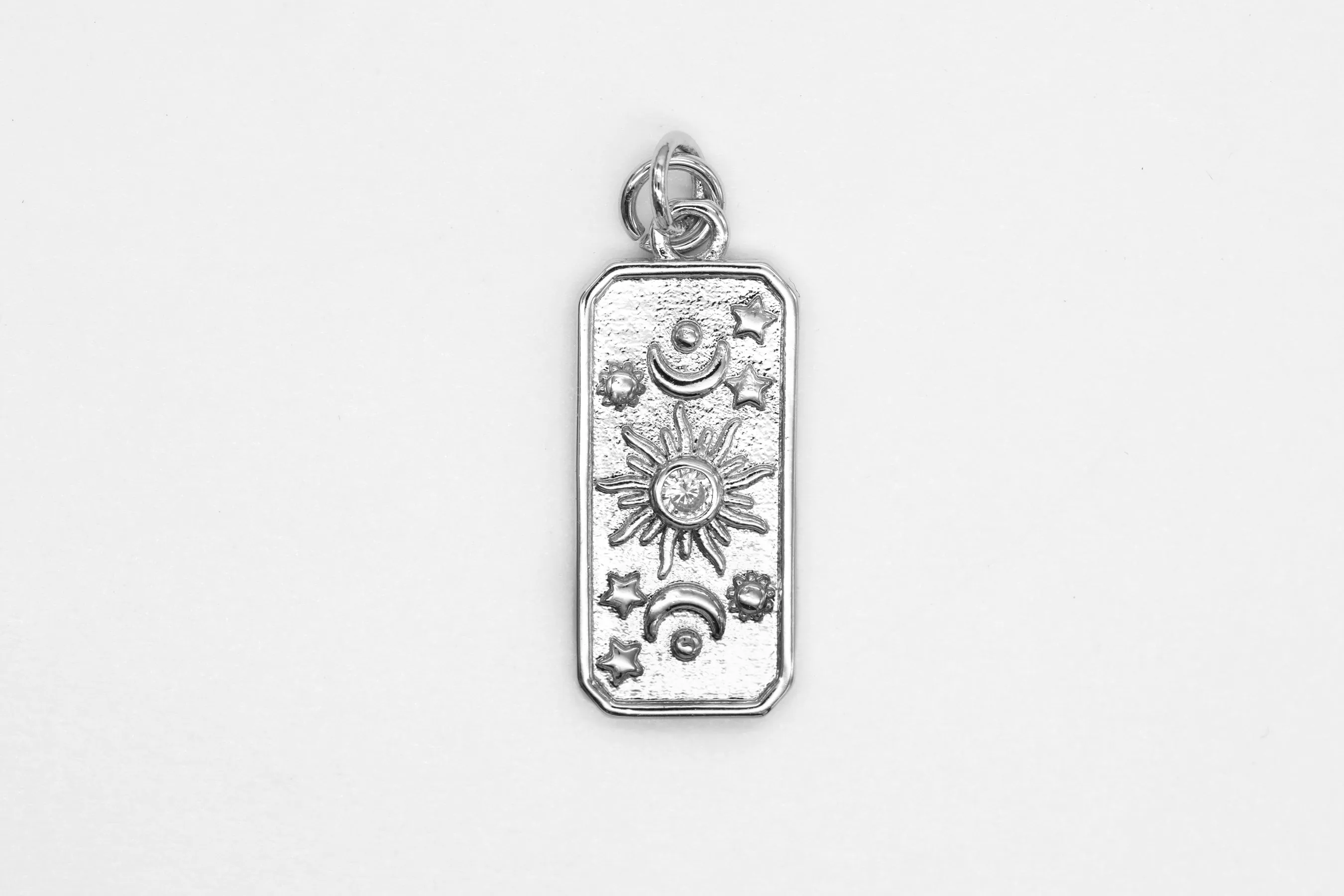 Silver Sun and Moon Charm