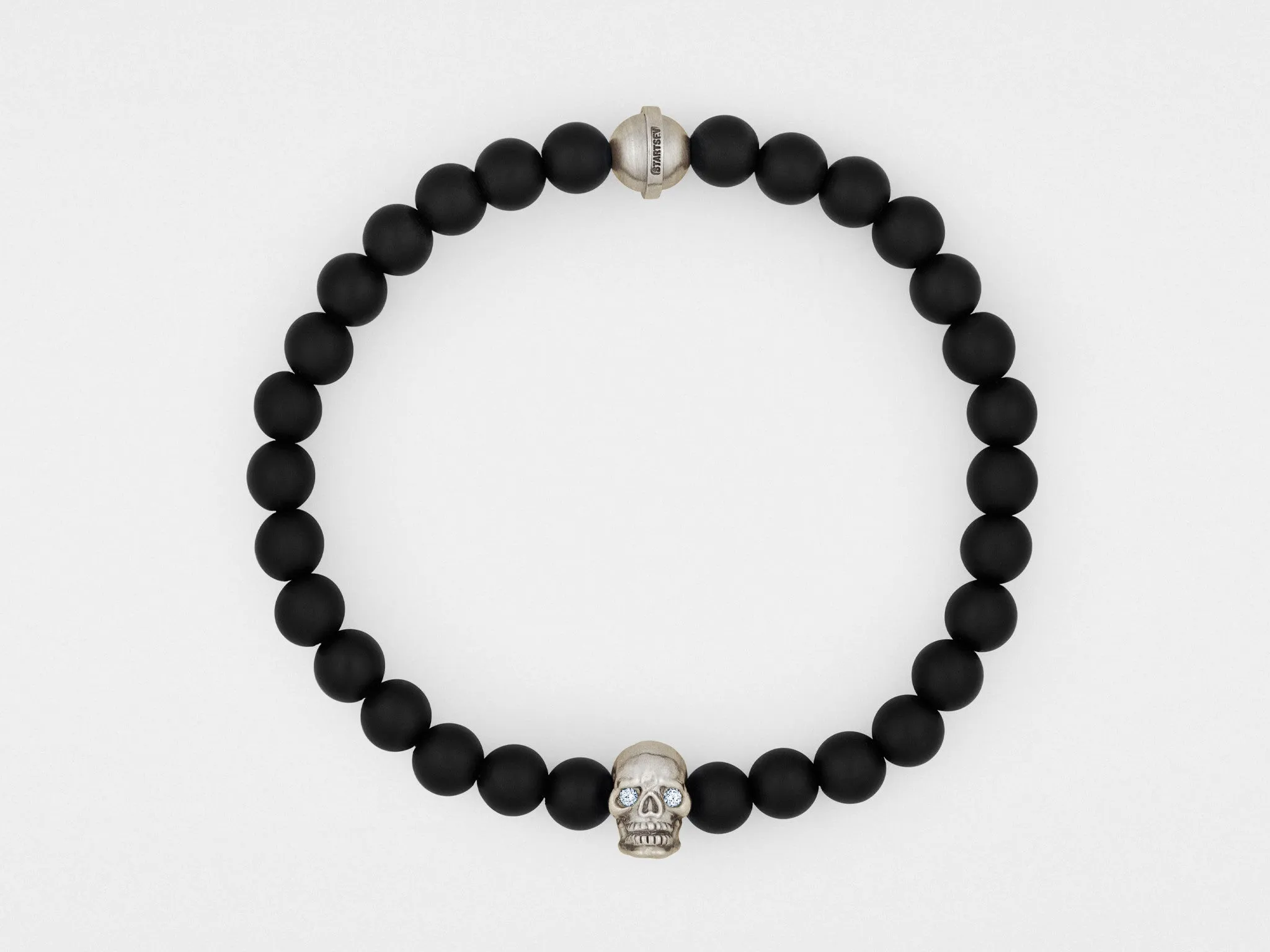 Skull Bracelet in Sterling Silver with Diamond Eyes and Black Onyx